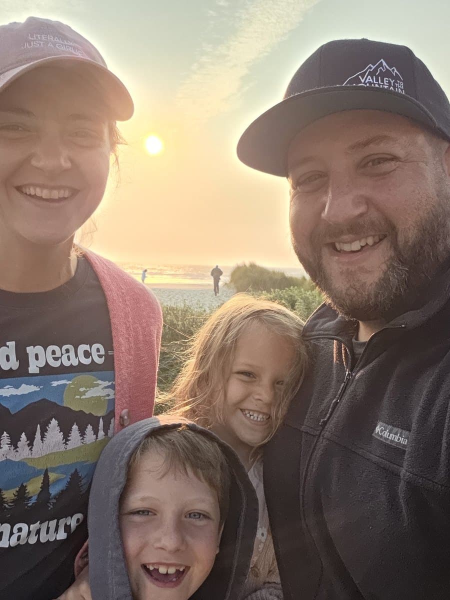 Bobby with his wife and two kids at the Oregon coast